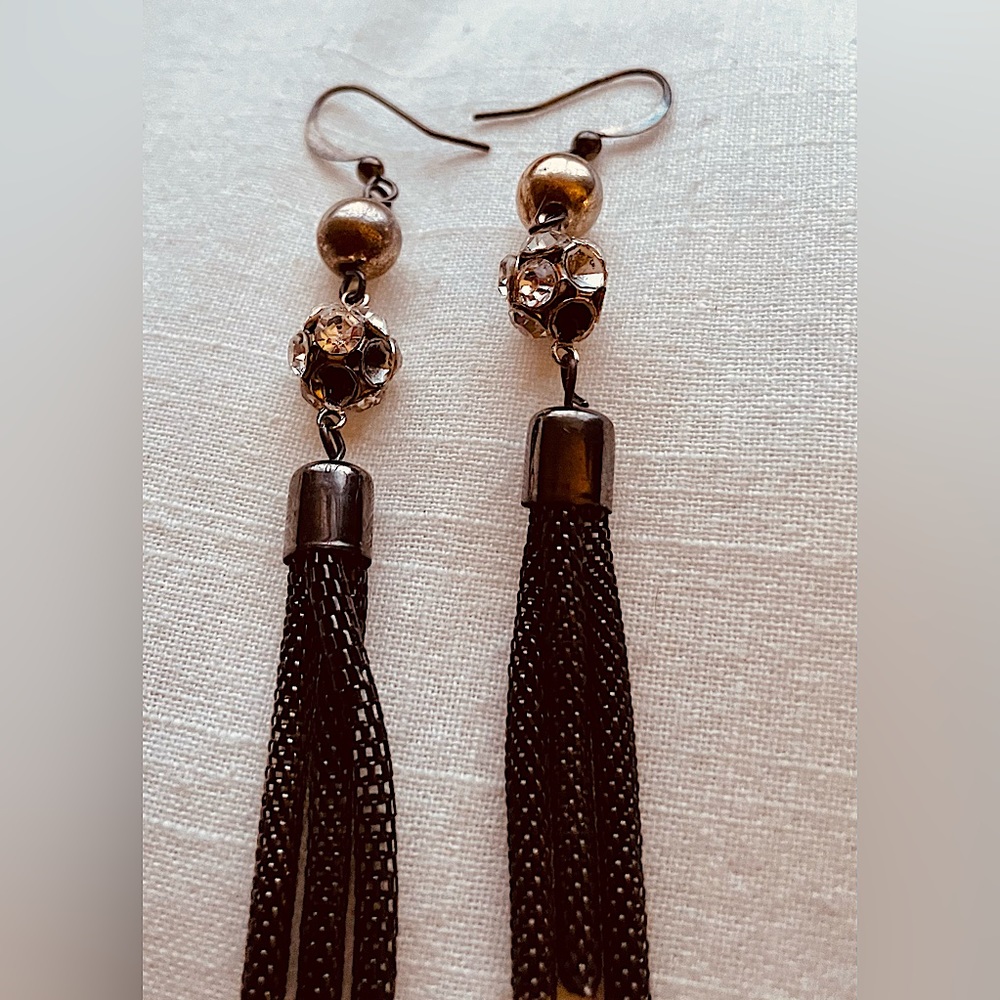 Rhinestone and chain link pierced earrings in a gold, black and bronze color.